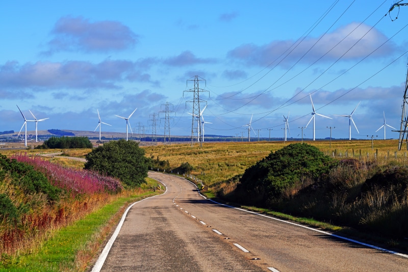 Wind turbines and power lines in Scotland