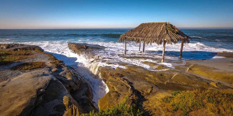 Thatched Hut on Rocky Coastline at Windansea Beach, California