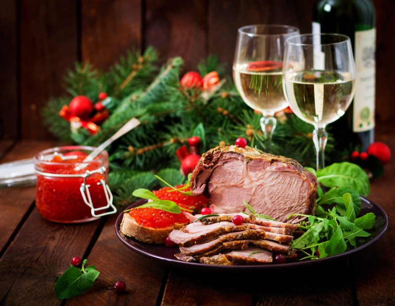 Christmas Feast with Roast Meat, Caviar, and Wine