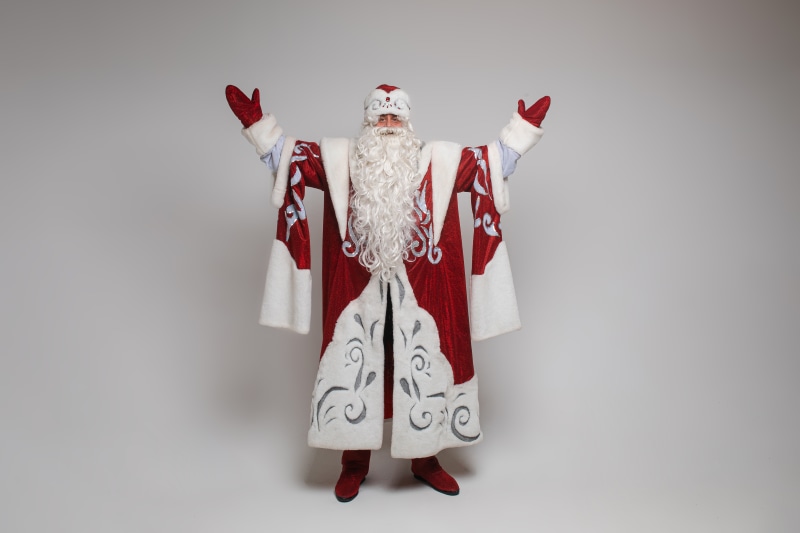 Santa Claus with arms raised