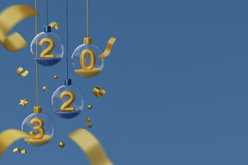 New Year 2023 ornaments with gold ribbons