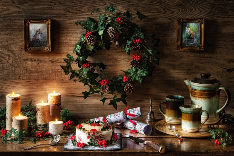Christmas still life with cake and candles