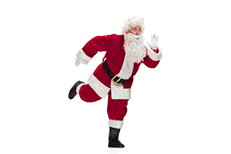 Santa Claus running on white background