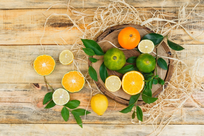 Citrus fruits on wooden planks