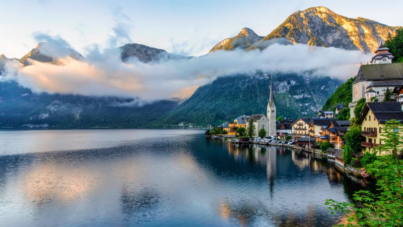 Hallstatt Village on Lake with Mountains and Clouds