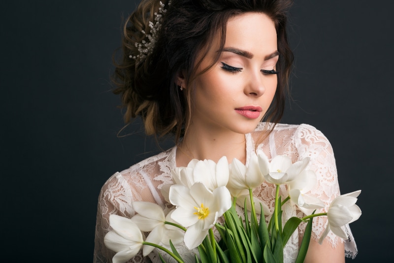 Woman with white tulips