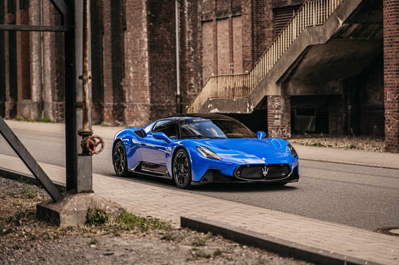 Blue Maserati Coupe on a Street