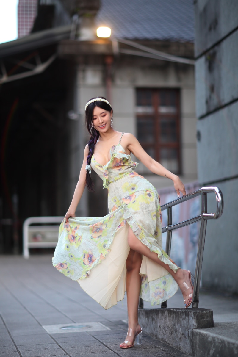 Asian woman in a floral dress with braid hair