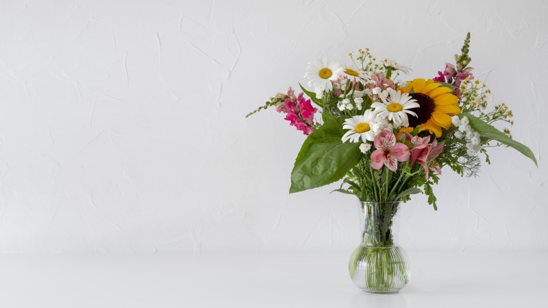 Bouquet of Sunflowers, Daisies, and Pink Flowers in a Vase