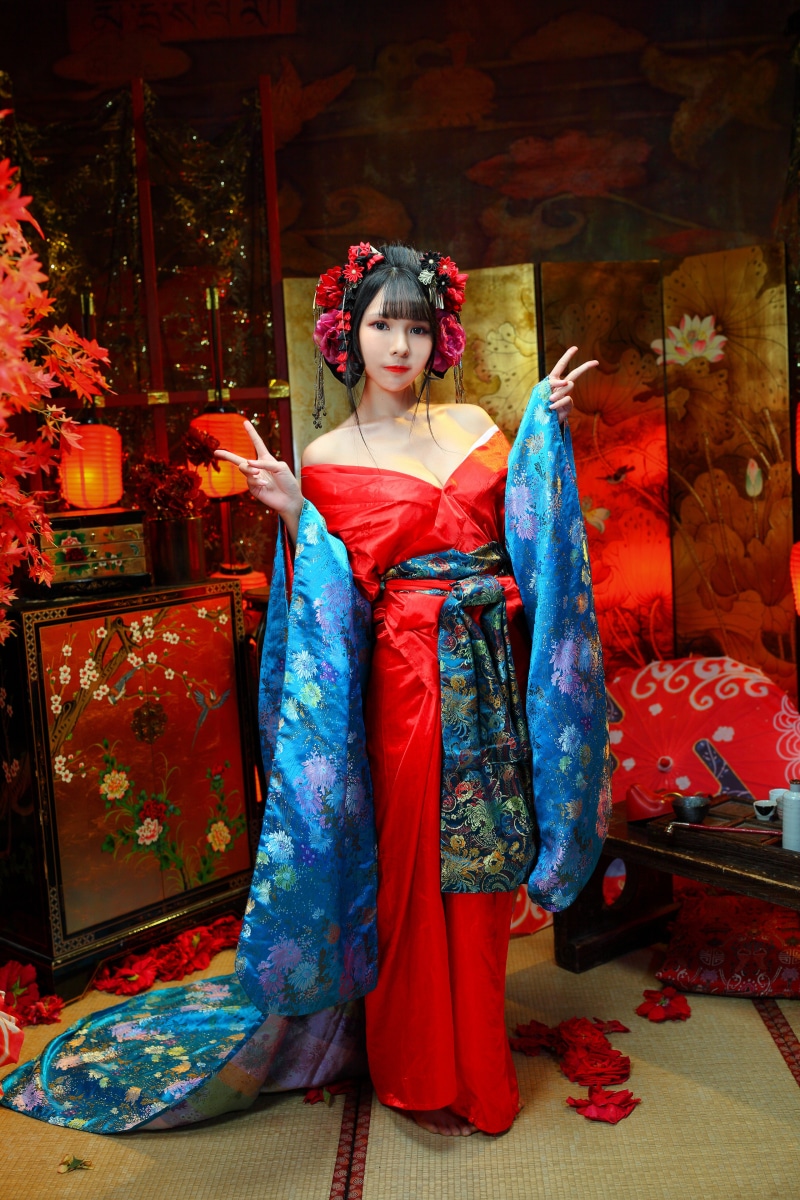 Woman in traditional Japanese kimono with floral ornaments