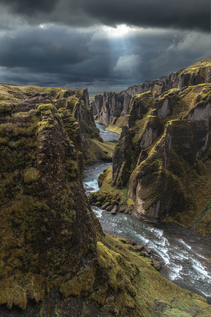 Fjaðrárgljúfur Canyon in Iceland with a river
