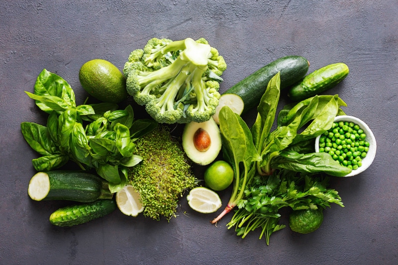 Assortment of fresh green vegetables and fruits