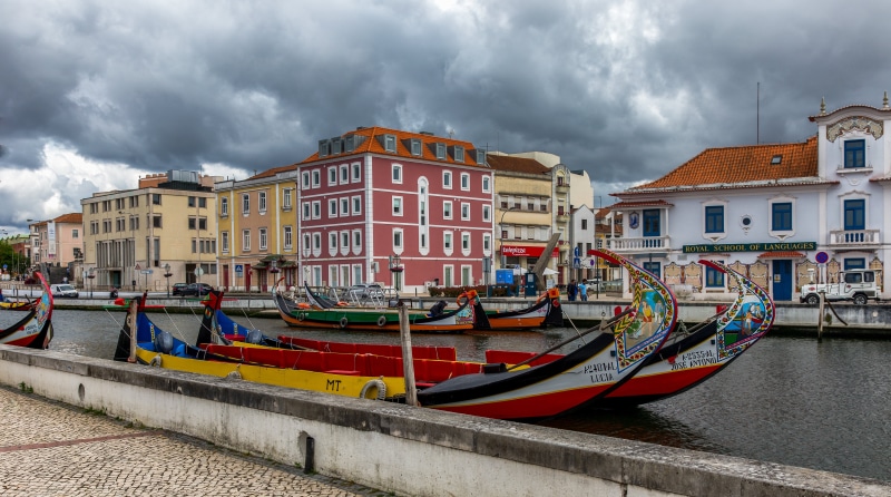 Moliceiro boats on a canal in Aveiro, Portugal