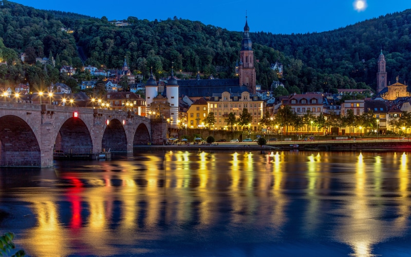 Heidelberg, Germany at Dusk with River and Bridge