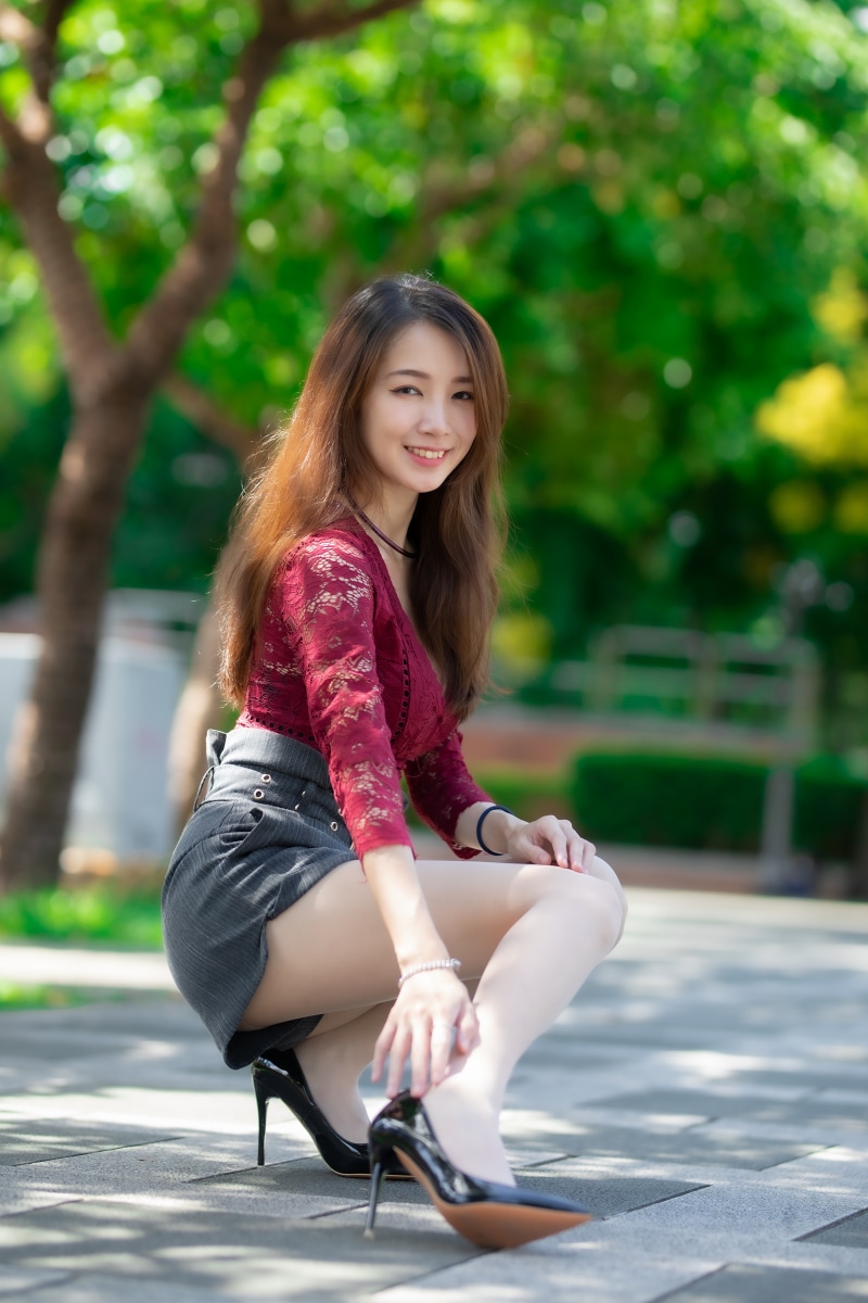 Asian Woman In Red Blouse And Shorts Posing Outdoors Hd Phone Wallpaper 