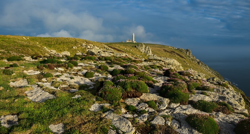 Lighthouse on a rocky coast in England