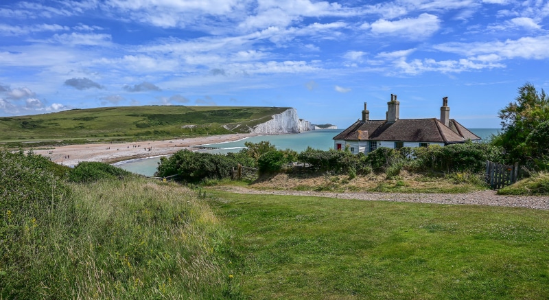 Cuckmere Beach Coastline with Houses in England