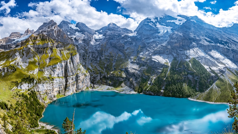 Oeschinensee Lake and Swiss Alps Mountains