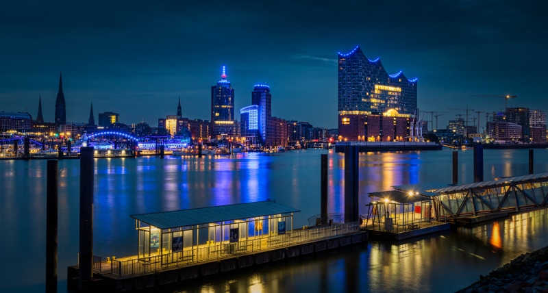 Hamburg skyline at night with Elbe river