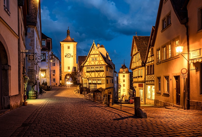 Rothenburg Germany street at dusk with tower