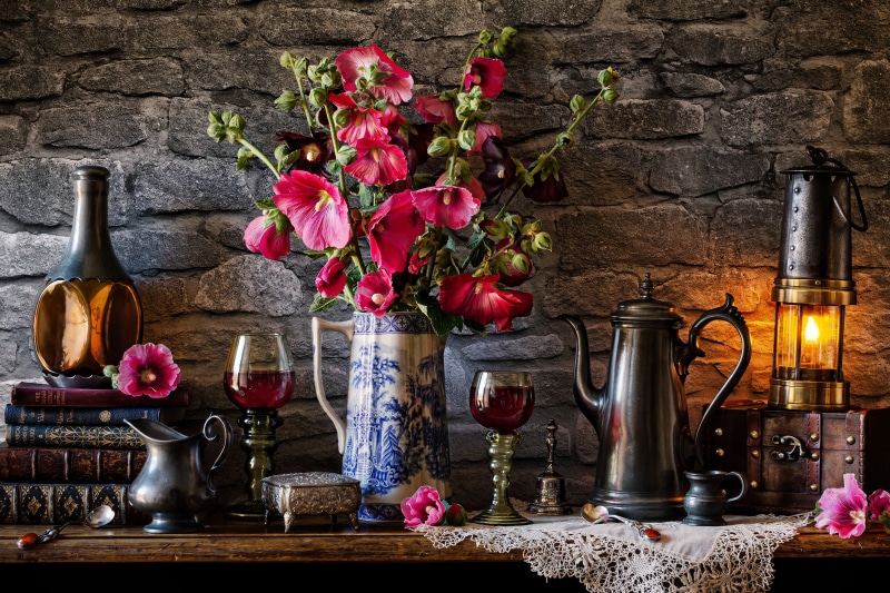 Still-life with flowers, wine, and kerosene lamp