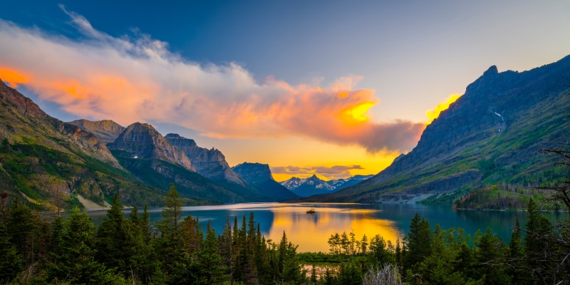 Glacier National Park Mountains and Lake at Sunset