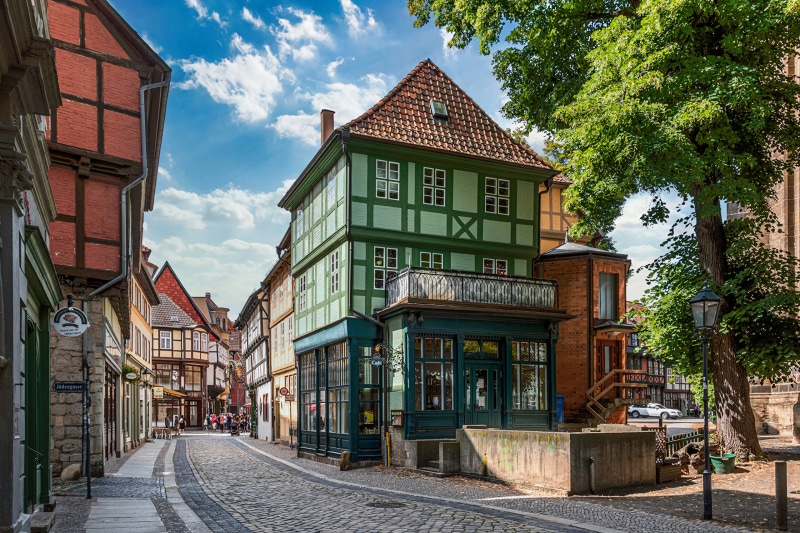 Half-timbered houses on a cobblestone street in Quedlinburg, Germany