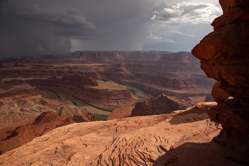 Dead Horse Point State Park Canyon with River and Stormy Clouds