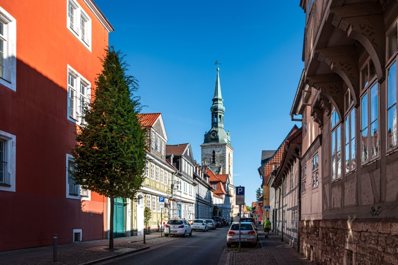 Street with church tower in Germany