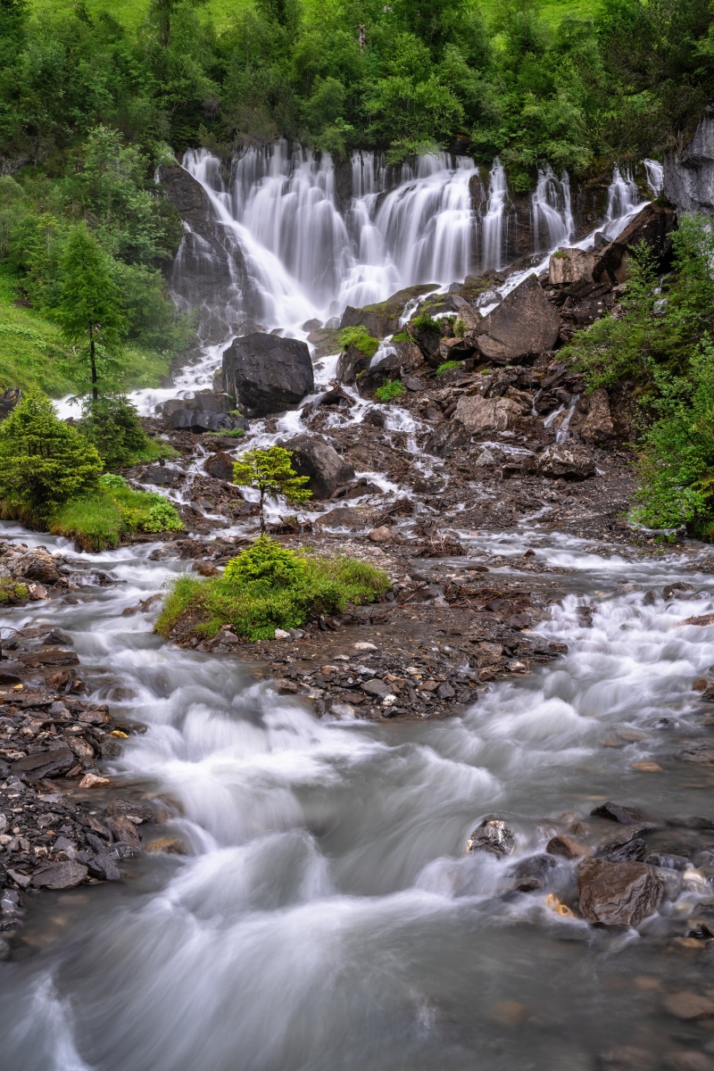 Waterfall cascading over rocks in the Swiss Alps