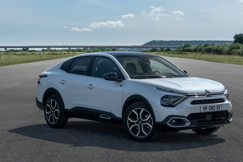 White Citroen C4 X electric car on asphalt