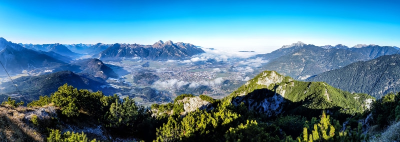 Panorama of Alps Mountains Valley with Clouds in Tyrol, Austria