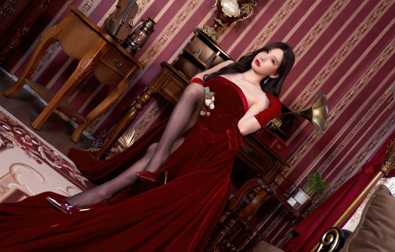 Brunette woman in red dress with gramophone