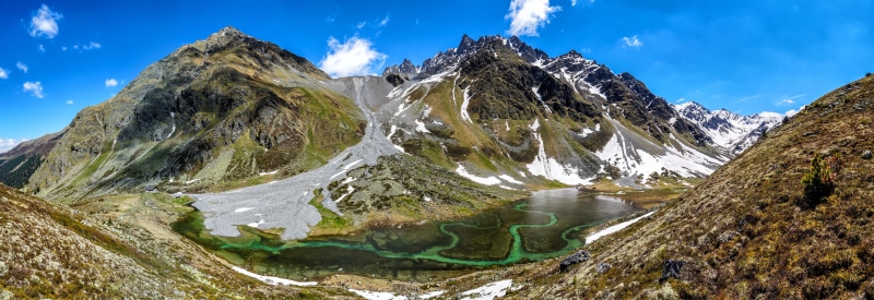 Panorama of Alps Mountains and Gebirgssee Lake in Austria
