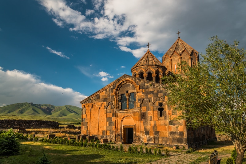 Hovhannavank Monastery in Armenia with Mountains and Clouds