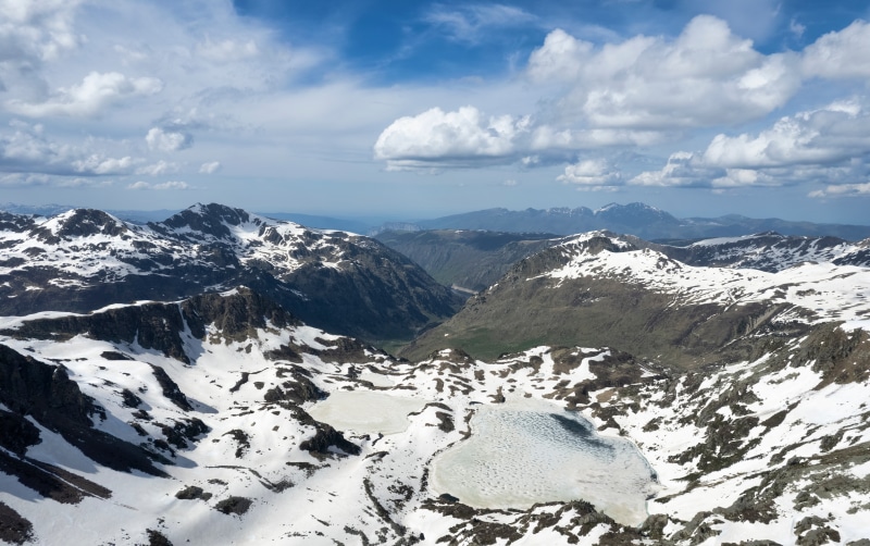 Snow-capped mountains and lakes in Ariege, France
