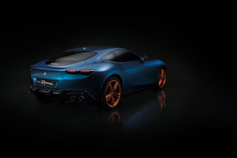 Blue Ferrari Roma Coupe from the back view