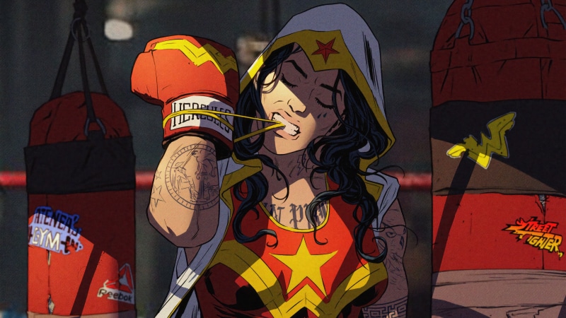 Wonder Woman in boxing gear with punching bags