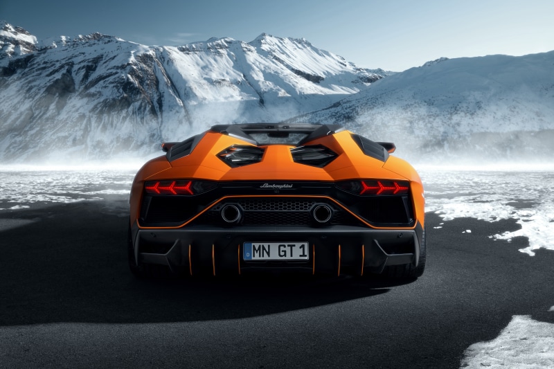 Orange Lamborghini Aventador GT1 in Snowy Mountains