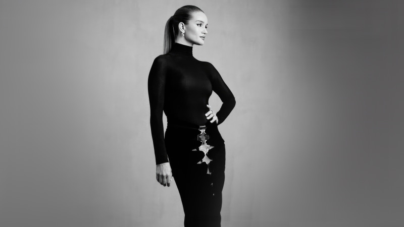 Rosie Huntington-Whiteley in a black dress