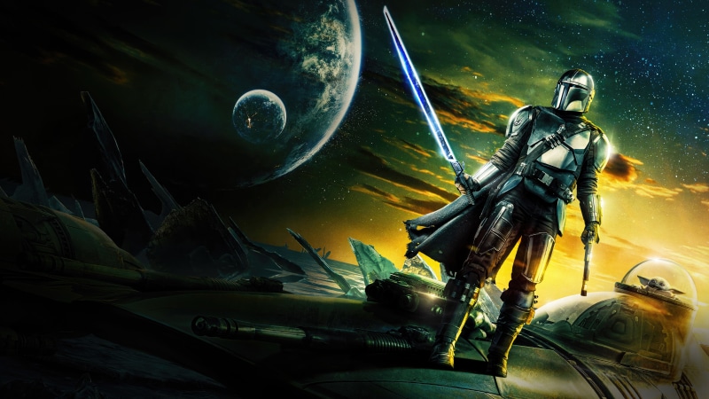 The Mandalorian with a lightsaber and blaster