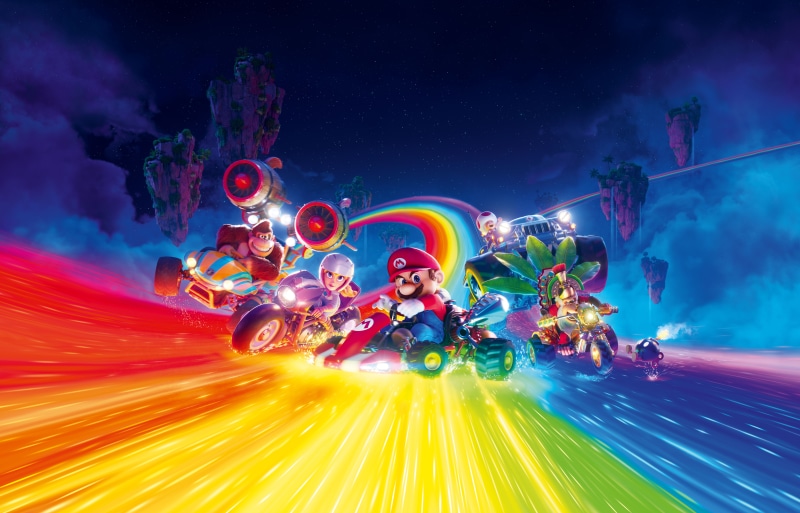 Mario Kart 8 Deluxe characters racing on Rainbow Road
