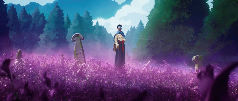 A person in a field of purple flowers
