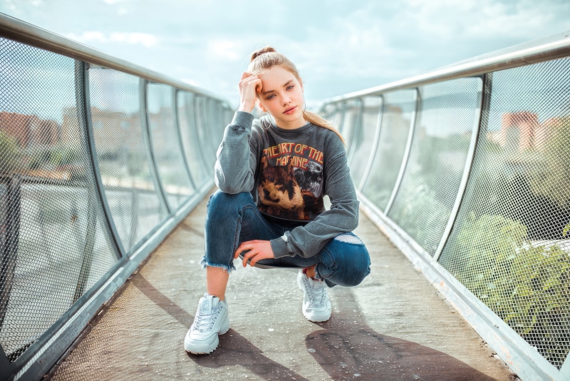 Girl on a bridge