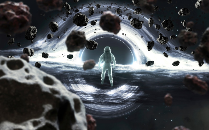 Astronaut near a black hole surrounded by asteroids