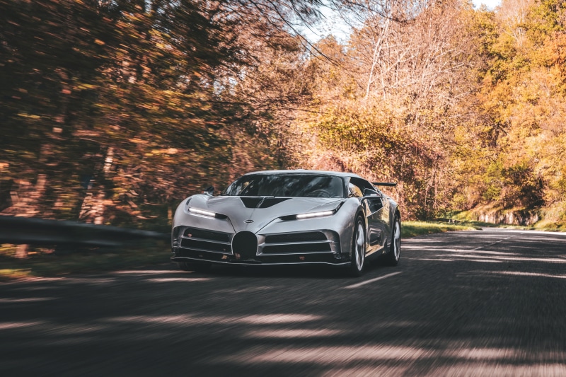Bugatti Centodieci driving on a road
