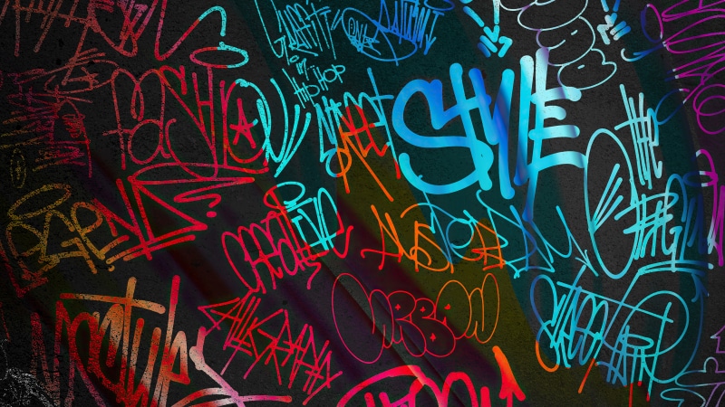 Graffiti art with colorful tags and words