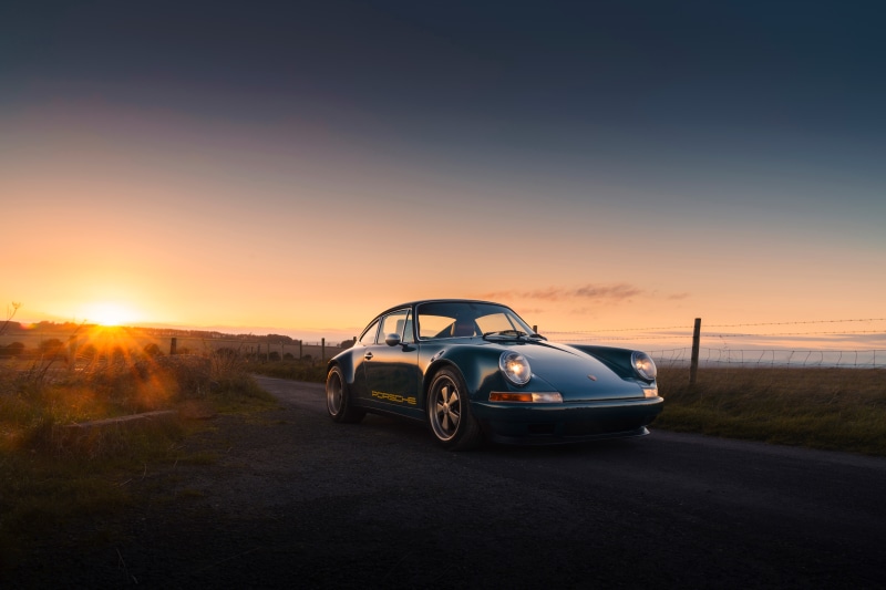 Green Porsche 911 at Sunset