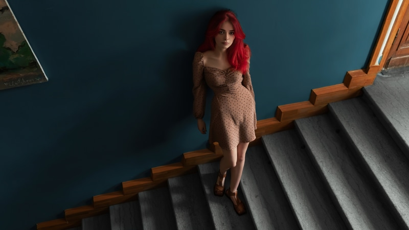 Model with red hair on stairs