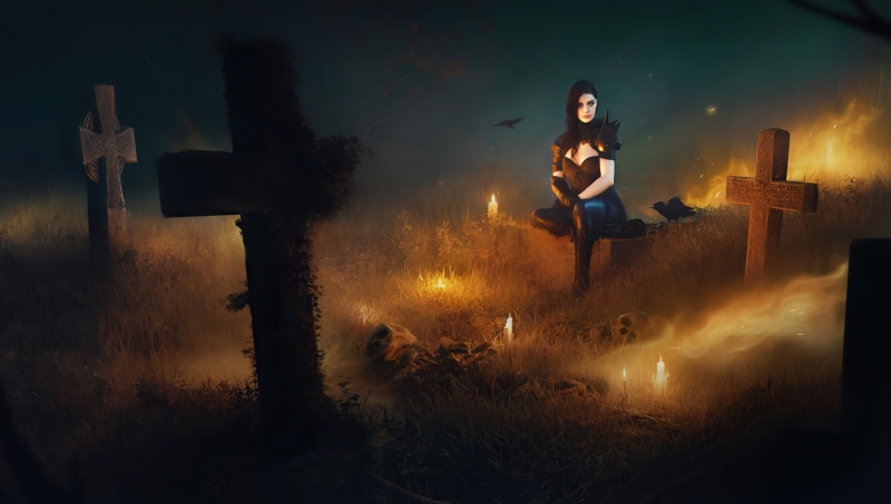 Woman in gothic attire in a graveyard